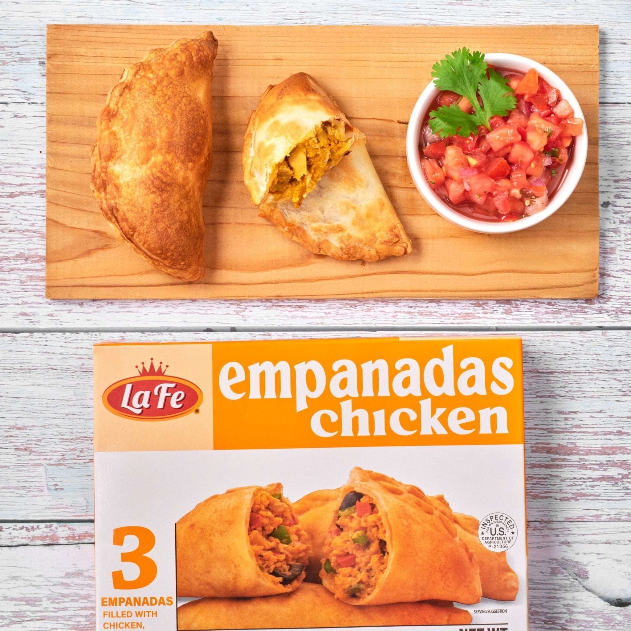 Delicious LA FE Chicken Empanadas served with fresh salsa, perfect for authentic Latin flavors and a satisfying meal.