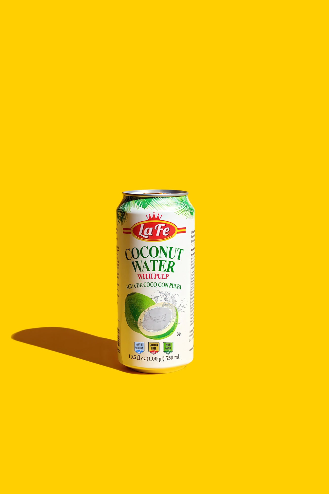 La Fe coconut water can with pulp on a bright yellow background, showcasing authentic Latin flavors in USA.