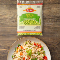 La Fe Frozen Green Pigeon Peas pack above a vibrant rice dish, perfect for authentic Latin meals and tropical flavors.