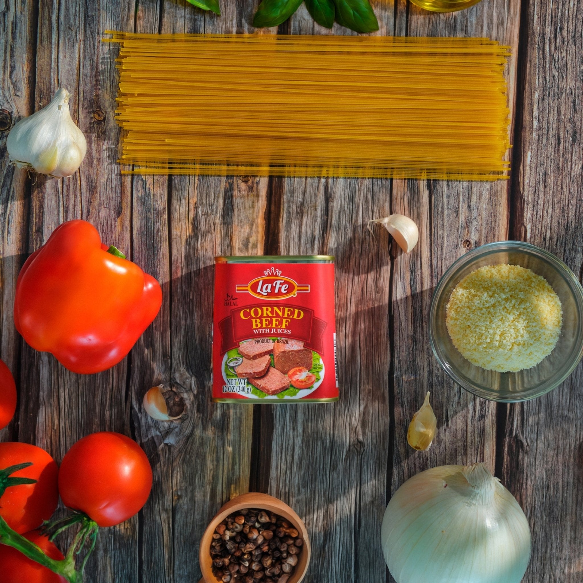 LAFE CORNED BEEF can surrounded by fresh vegetables and pasta, perfect for creating authentic Latin dishes.