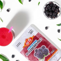 La Fe Blackberry Pulp packaging with fresh blackberries and smoothie, showcasing authentic Latin flavors and quality ingredients.