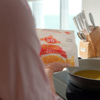 La Fe Fries Shoestring package being prepared in a kitchen for authentic Latin cooking.