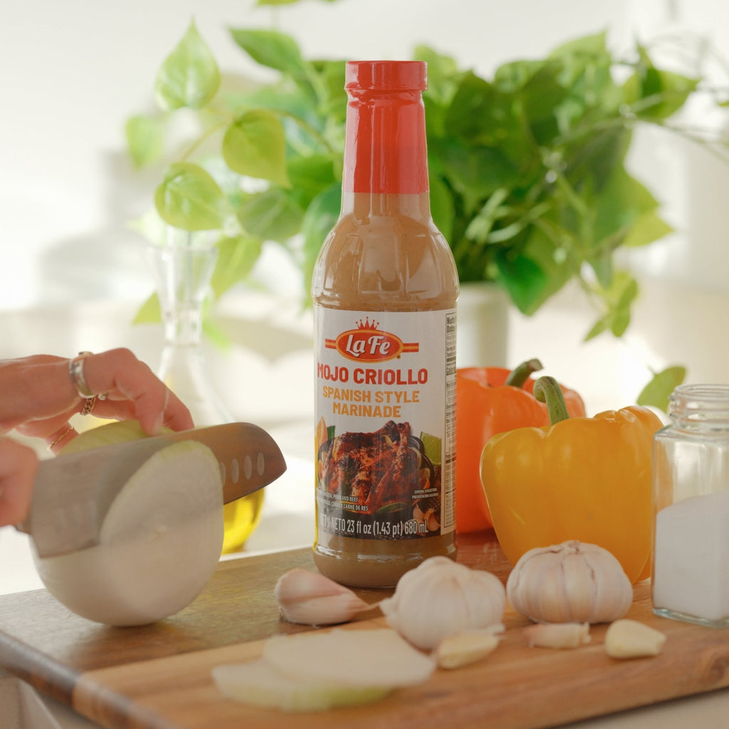 LA FE Mojo Criollo marinade with fresh ingredients, perfect for authentic Latin dishes and flavors.