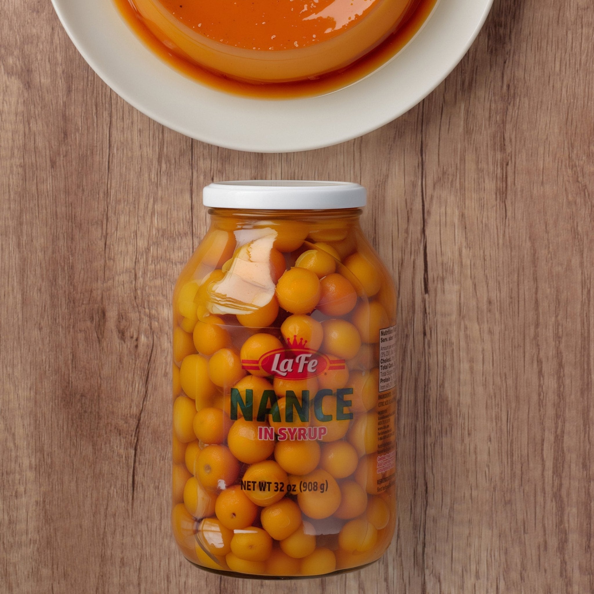 La Fe Nance in syrup 32 oz jar, a tropical delight perfect for authentic Latin recipes and desserts.