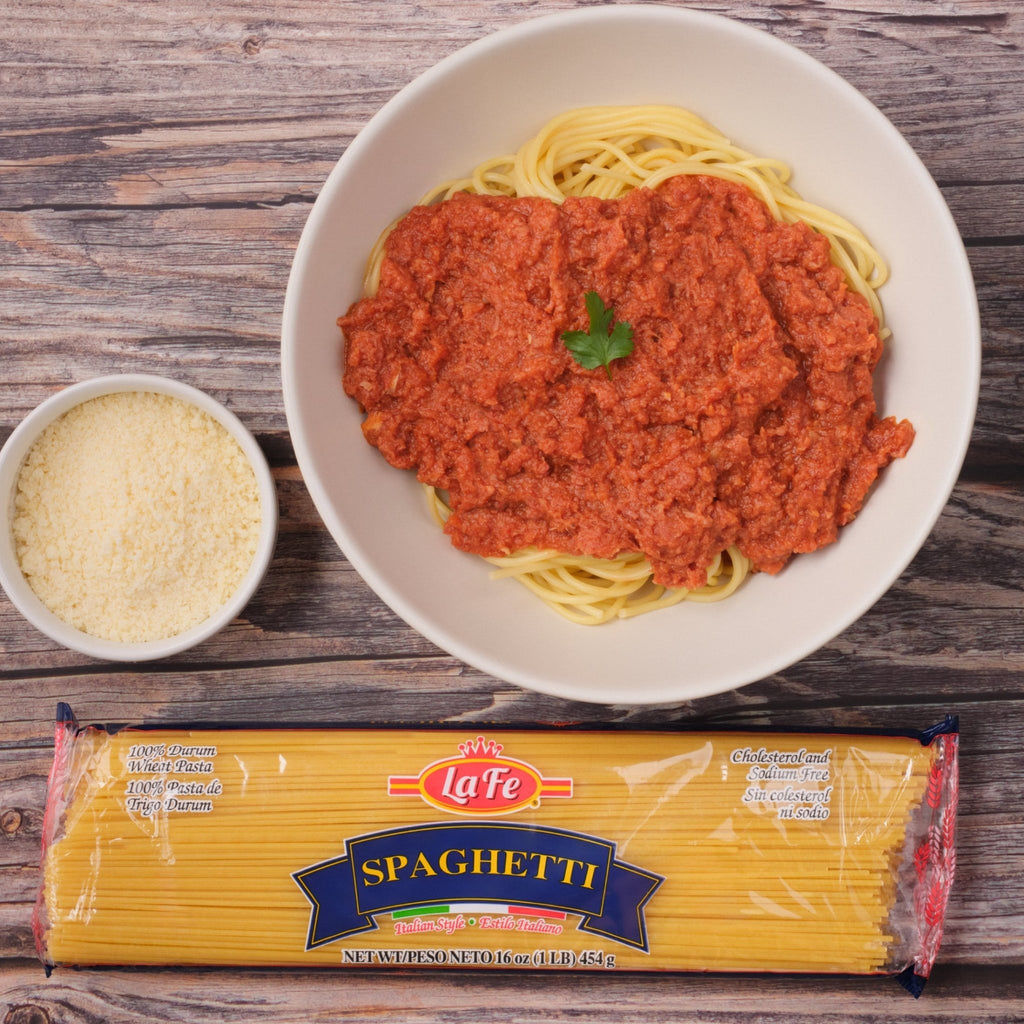 Delicious La Fe spaghetti served with sauce, showcasing authentic Latin flavors and quality ingredients.