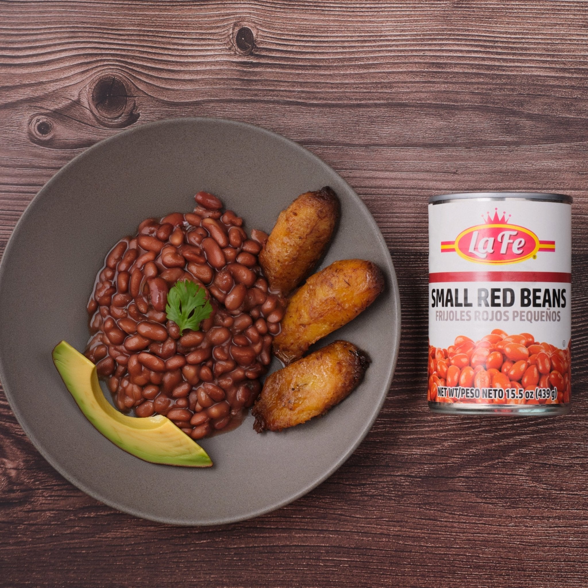 Bowl of La Fe Small Red Beans with plantains, showcasing authentic Latin food and flavors. Perfect for diverse dishes.