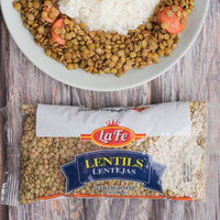 La Fe dry lentils package with cooked rice and carrots, perfect for authentic Latin food and healthy meals.