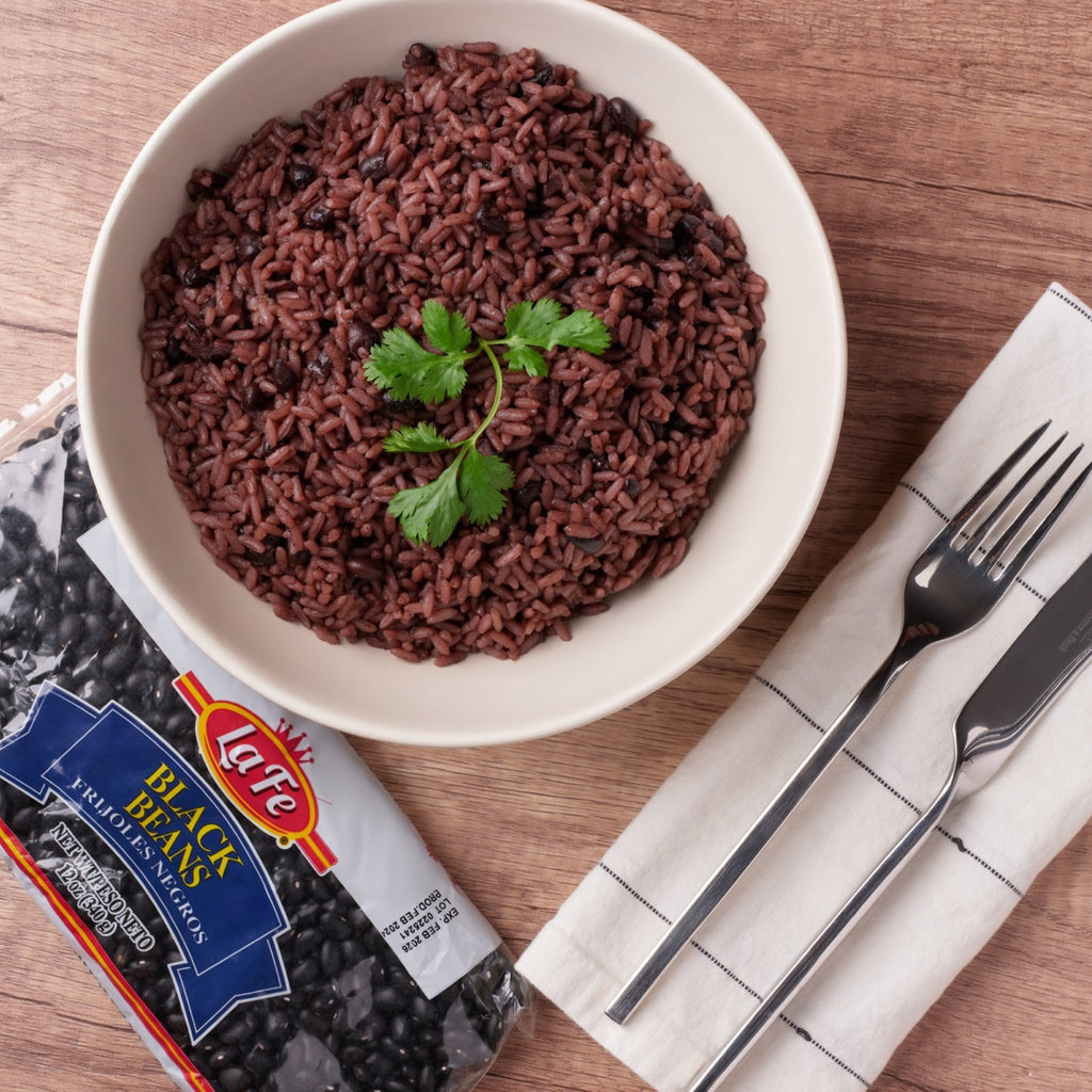 Bowl of LA FE dry black beans garnished with cilantro, showcasing nutritious Latin food for healthy meals.