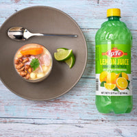 La Fe Lemon Juice bottle with a refreshing dish, showcasing authentic Latin flavors and quality Latin foods.