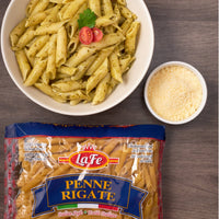 La Fe Penne Rigate pasta with pesto sauce and cheese, representing quality Latin food and authentic Italian flavors.
