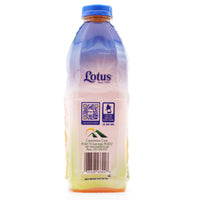 LOTUS ORANGE-&-CARROT beverage bottle, rich in vitamins, perfect for authentic Latin flavors and healthy nutrition.