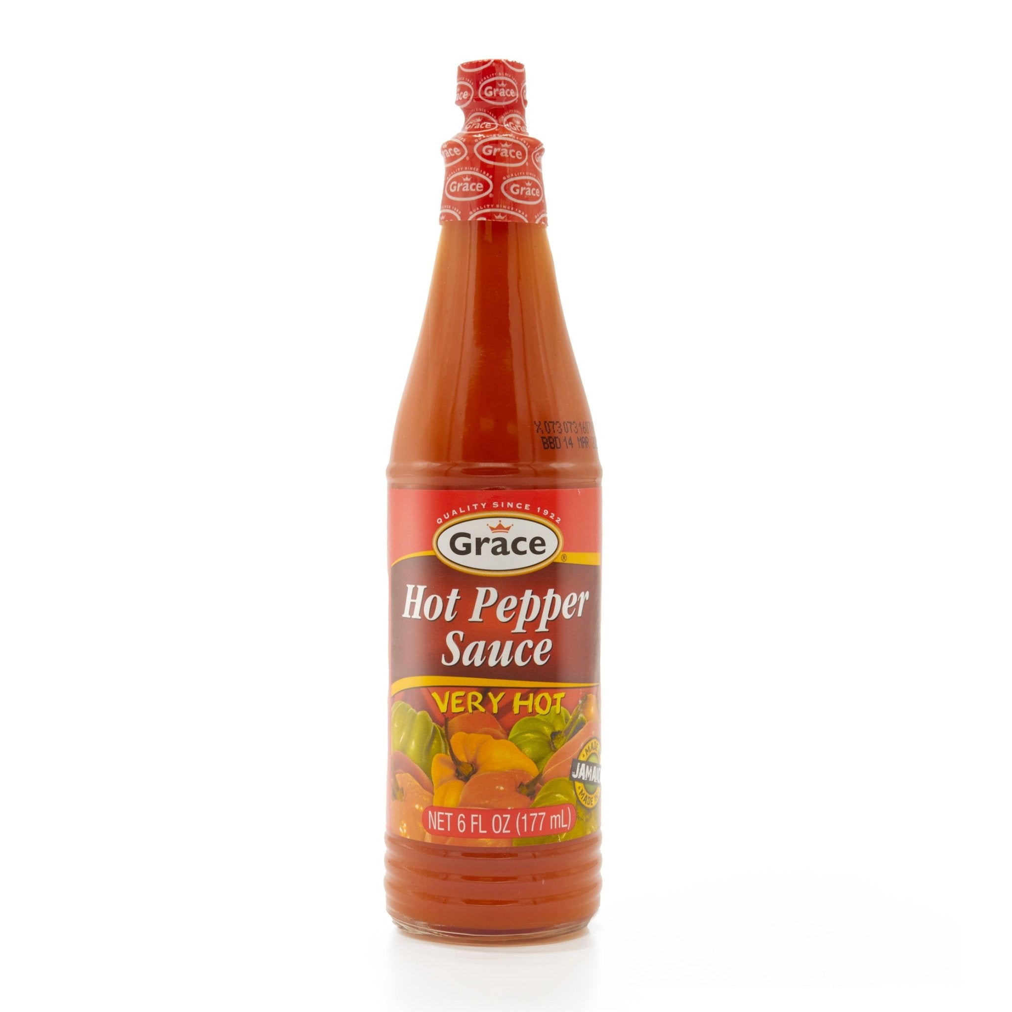 Grace Hot Pepper Sauce bottle, perfect for adding spice to Latin dishes and enhancing flavors in authentic cuisine.