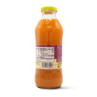 T/RHY GUAVA CARROT drink showcasing tropical flavors and quality Latin food in a stylish bottle.