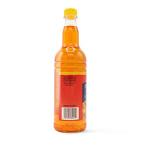Grace Syrup Pine Orange 12x25.5 oz PET bottle, perfect for enhancing authentic Latin recipes with tropical flavors.