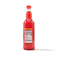 Grace Syrup Fruit Punch in a plastic bottle, perfect for enhancing beverages and desserts with authentic Latin flavors.