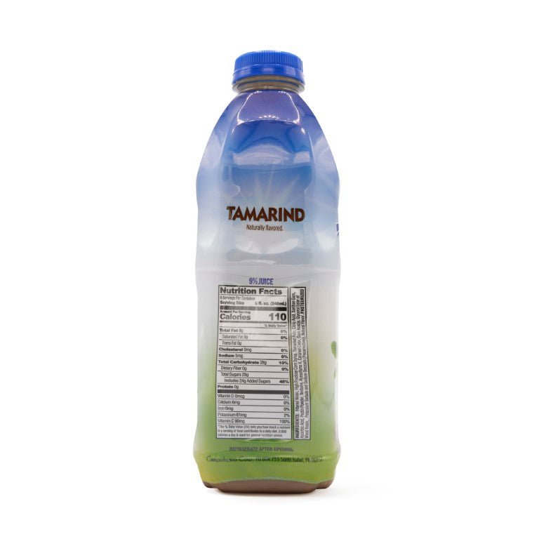 Lotus Tamarind juice bottle showcasing a blend of natural ingredients, perfect for enhancing Latin recipes.